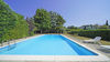 Villa singola con ampio giardino privato e piscina a pochi passi da porto Torchio a Manerba del Garda