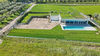 Villa moderna su unico livello con piscina, tetto verde panoramico e vista lago esclusiva a Manerba del Garda