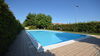 Spazioso bilocale con giardino privato in residence con piscina a Puegnago del Garda