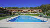 Bilocale con giardino privato in residence con piscina a Puegnago del Garda