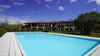 Luminoso trilocale con giardino in residence con piscina a Manerba del Garda