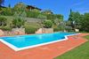 Villetta con giardino privato e vista lago in contesto con piscina a Soiano del Lago