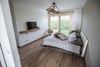 Elegante quadrilocale in piccolo contesto con vista lago mozzafiato a Padenghe sul Garda