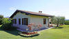 Villa a schiera di testa con giardino privato e garage doppio, in residence con piscina