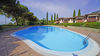 Bilocale in residence con piscina, con due giardini terrazzati e posto auto, in vendita a Gardone Riviera