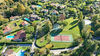 Villa singola con giardino e terrazza vista lago, in contesto esclusivo con piscina e campo da tennis, in vendita a San Felice del Benaco