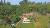 Villa singola con giardino e terrazza vista lago, in contesto esclusivo con piscina e campo da tennis, in vendita a San Felice del Benaco