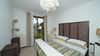 Trilocale con giardino esclusivo vista lago, in residence con piscina, in vendita a Gardone Riviera