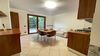 Bilocale con corte esclusiva e garage, in curato residence con piscina vista lago, a Gardone Riviera in vendita