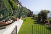 Bilocale con terrazza vista lago in residence con piscina