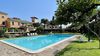 Bilocale al piano terra con piscina e parco a lago