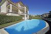 Trilocale con giardino privato e piscina in vendita a Toscolano Maderno