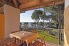 Bilocale fronte lago con vista lago sul lungolago di Maderno