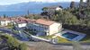 Bilocale con portico in nuovo residence con piscina a San Giorgio