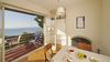 Bilocale con terrazzo panoramico e magnifica vista Lago in residence con piscina 