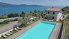 Bilocale con vista lago in residence con piscina